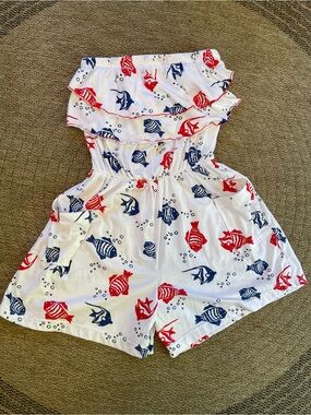 Strapless white romper with red & blue nautical fish print & ruffled neckline